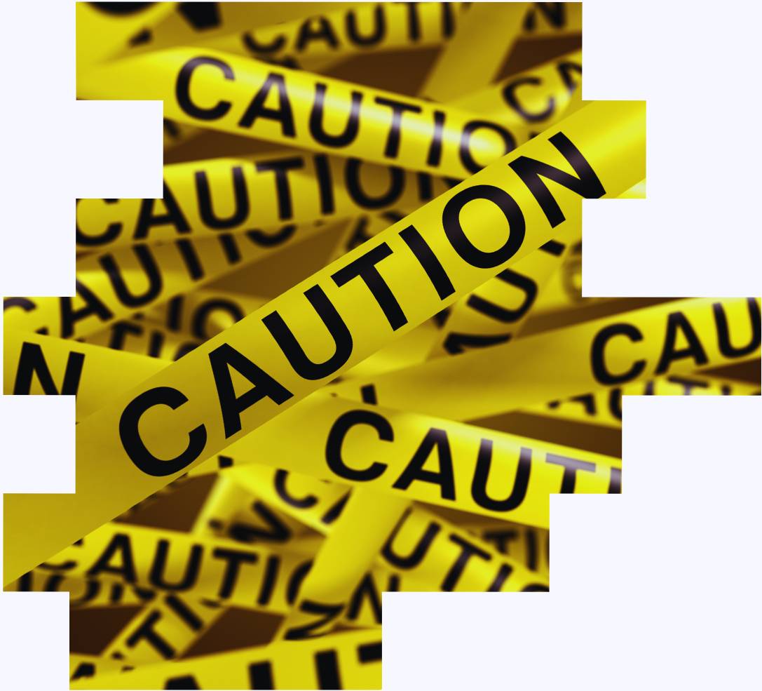 An image of safety tape with the word caution written on it to illustrate the many risks associated with shift work fatigue