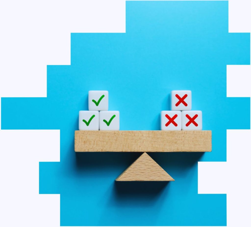 An image of a wooden seesaw with positive and negative blocks to represent the balance organisations need to achieve around the health effects of night shift work