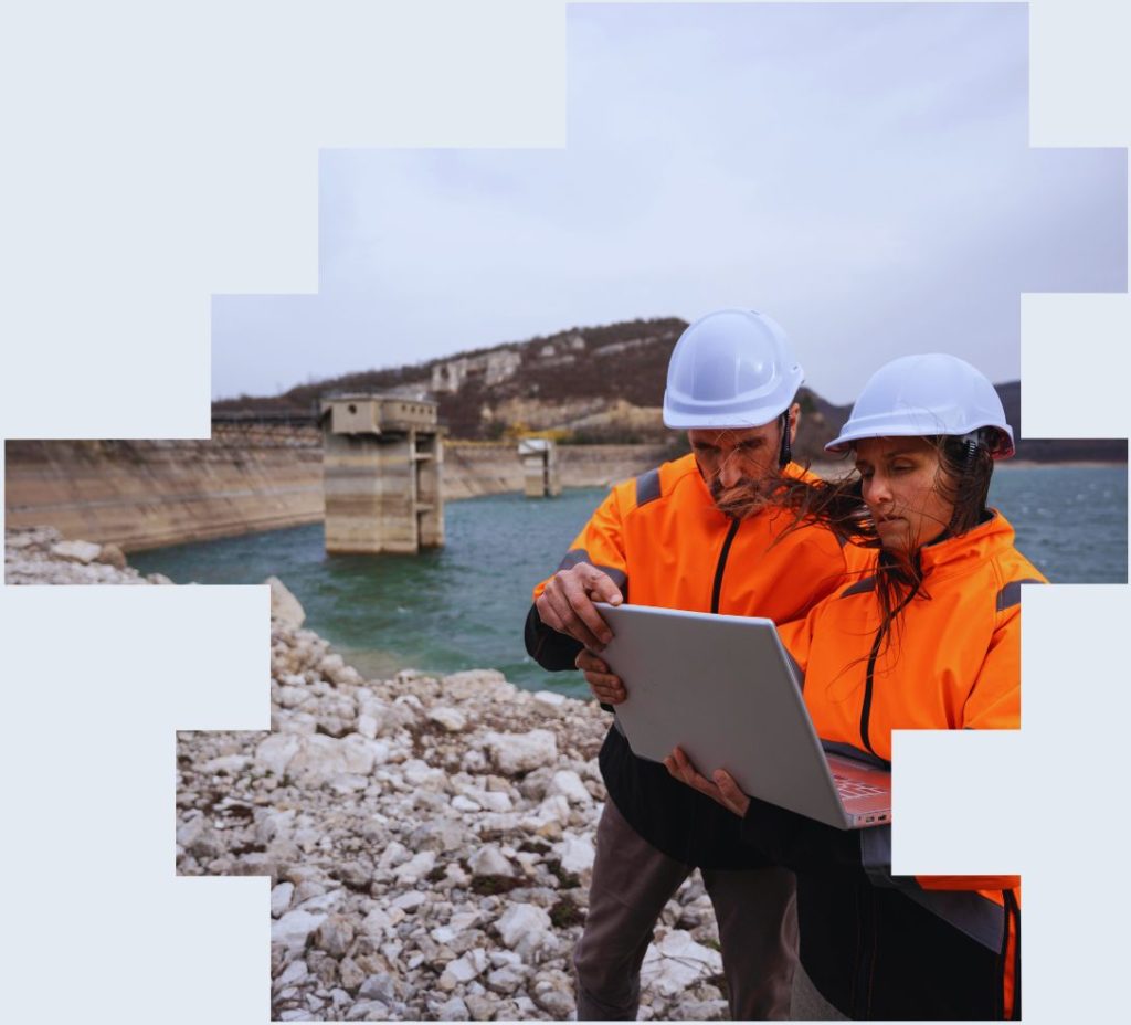 An image of two shift workers from a water utility company surveying a reservoir to highlight the need for modern shift patterns