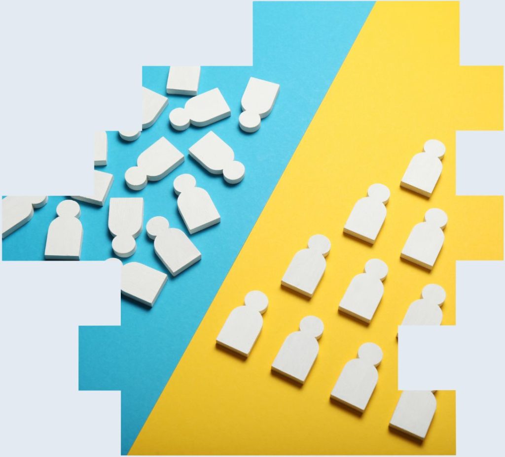 An image of a set of wooden cut outs of people being organised into straight lines to illustrate how an optashift webinar can provide a solid grounding in shift work improvement best practice