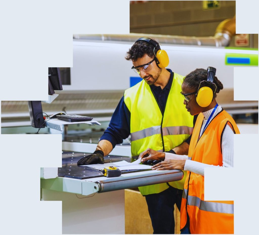An image of two manufacturing shift workers, with one coaching the other, illustrating the importance of creating a future of shift work that’s supports career development and diversity