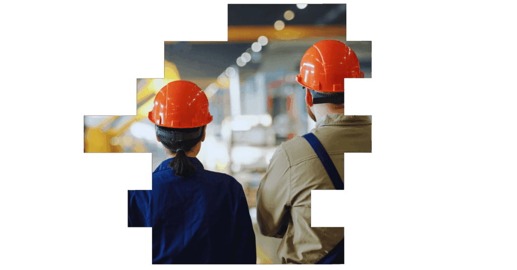 An image of a three manufacturing shift workers facing away from the camera to represent how the future of shift work is changing